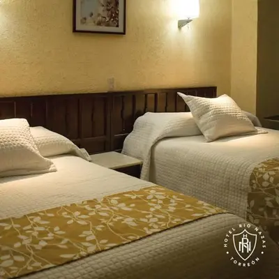 Cama o camas de una habitación en Hotel Rio Nazas