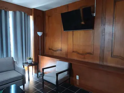 Una televisión o centro de entretenimiento en Hotel Rio Nazas