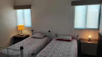 Cama o camas de una habitación en Casa con alberca pirvada