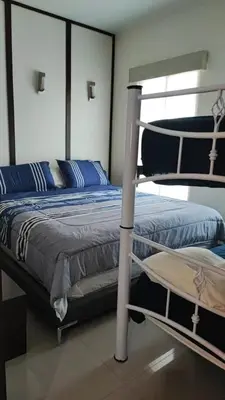 Cama o camas de una habitación en Casa con alberca pirvada