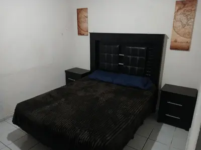 Cama o camas de una habitación en Departamento chico para tu estancia en ciudad juarez
