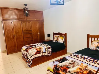 Cama o camas de una habitación en Alojamiento ideal