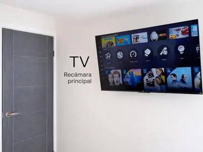 Una televisión o centro de entretenimiento en Casa Morada
