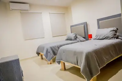 Cama o camas de una habitación en Espectacular condo en Blue Marlin Zona Dorada Beach
