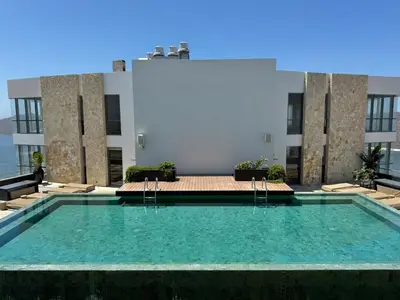 Piscina en o cerca de Departamento moderno a pie de playa