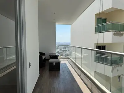 Un balcón o terraza de Departamento moderno a pie de playa