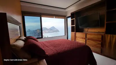 Cama o camas de una habitación en Departamento lujoso Cerro 38 Vista Hermosa