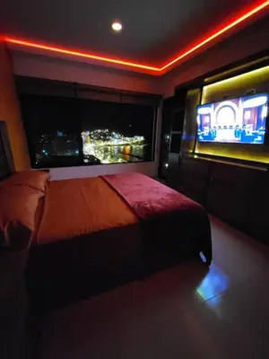 Cama o camas de una habitación en Departamento lujoso Cerro 38 Vista Hermosa