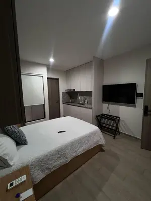 Cama o camas de una habitación en Antara Loft