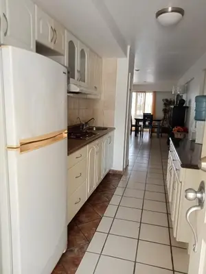 Una cocina o zona de cocina en Condominio 204