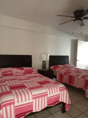 Cama o camas de una habitación en Condominio 204