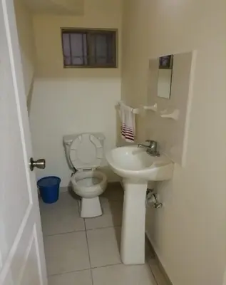 Un baño de Excelente casa cómoda