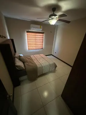 Cama o camas de una habitación en House in a private residential development