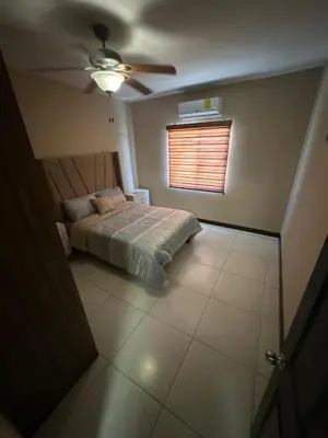 Cama o camas de una habitación en House in a private residential development