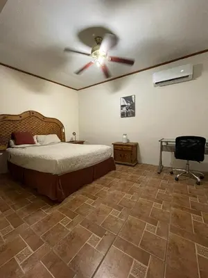 Cama o camas de una habitación en Casa De la Rosa