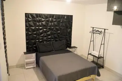 Cama o camas de una habitación en Departamento Cercano UACH 2