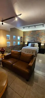 Cama o camas de una habitación en Luxury Suites Dubai a 100 mts del consulado