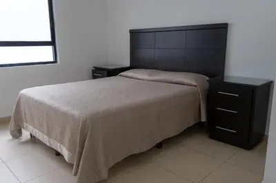 Cama o camas de una habitación en Apartamentos Torre II Condominios - Pet Friendly