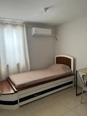 Cama o camas de una habitación en Casa Ceiba-Hospital Angeles