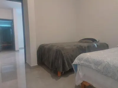 Cama o camas de una habitación en Casa San Rafael Moderna y Elegante