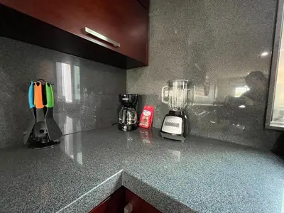 Una cocina o zona de cocina en QB Departamento de lujo en Quintas espacioso y confortable