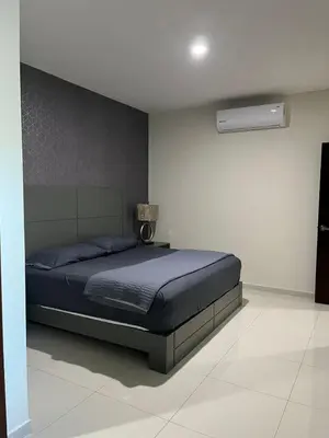 Cama o camas de una habitación en QB Departamento de lujo en Quintas espacioso y confortable