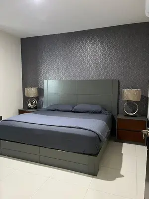 Cama o camas de una habitación en QB Departamento de lujo en Quintas espacioso y confortable