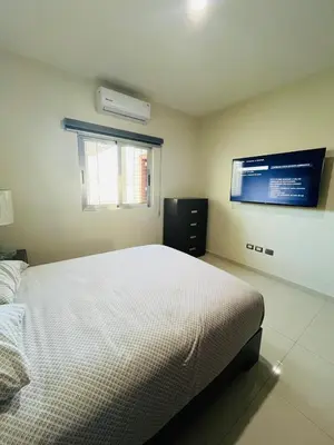 Cama o camas de una habitación en QB Departamento de lujo en Quintas espacioso y confortable