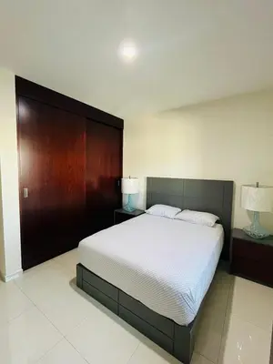 Cama o camas de una habitación en QB Departamento de lujo en Quintas espacioso y confortable