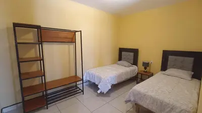 Cama o camas de una habitación en Departamento cora