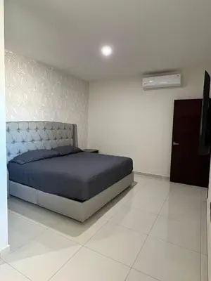 Cama o camas de una habitación en QC Departamento privado de lujo en Quintas