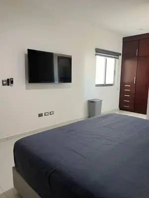 Cama o camas de una habitación en QC Departamento privado de lujo en Quintas