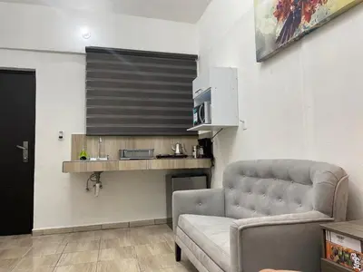 Una cocina o zona de cocina en Bonito Loft en el corazón de Arteaga, Coahuila