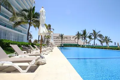 Piscina en o cerca de Oceanview Luxury Condo at Peninsula Mazatlán