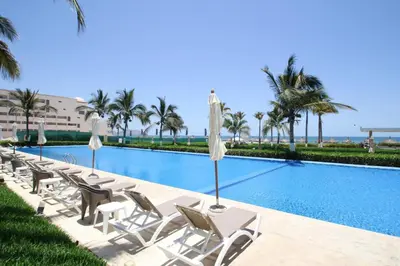 Piscina en o cerca de Oceanview Luxury Condo at Peninsula Mazatlán
