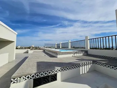 Un balcón o terraza de Las Hadas: City Condo with Pool