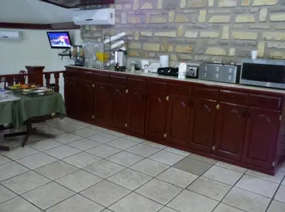 Una cocina o zona de cocina en Palms Hotel