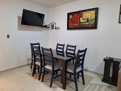 Una televisión o centro de entretenimiento en Casa Coruña in Durango