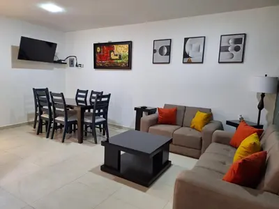 Una televisión o centro de entretenimiento en Casa Coruña in Durango