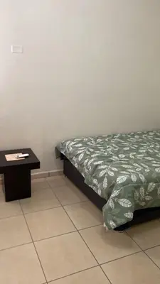 Cama o camas de una habitación en casa en sector Miramar