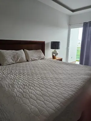 Cama o camas de una habitación en Departamento estilo Hotel