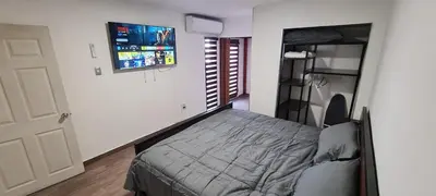 Cama o camas de una habitación en Casa cómoda y completa con 2 camas king size y 1 cama twin