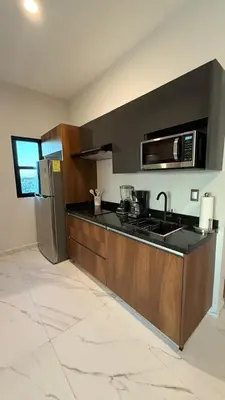 Una cocina o zona de cocina en Departamento Punta del Sol