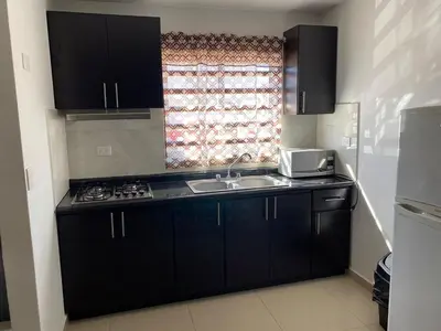 Una cocina o zona de cocina en Residencia completa cerca de zona norte