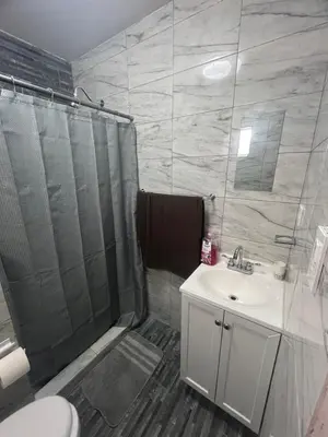 Un baño de Departamentos MAC