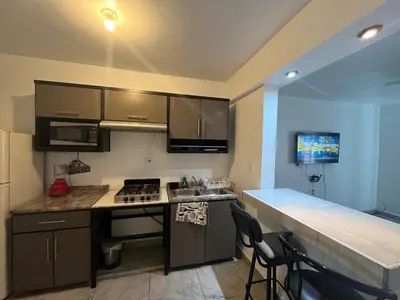 Una cocina o zona de cocina en Departamentos MAC