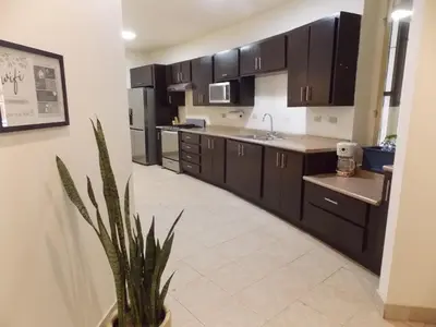 Una cocina o zona de cocina en La Sierra Departamento 1