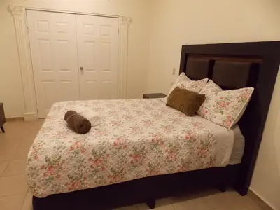 Cama o camas de una habitación en La Sierra Departamento 1