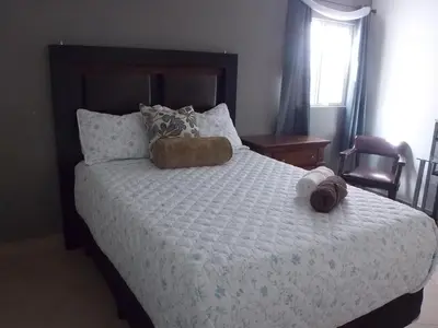 Cama o camas de una habitación en La Sierra Departamento 1