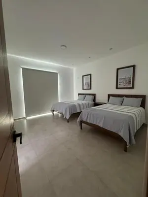 Cama o camas de una habitación en Casa Ohana San Carlos